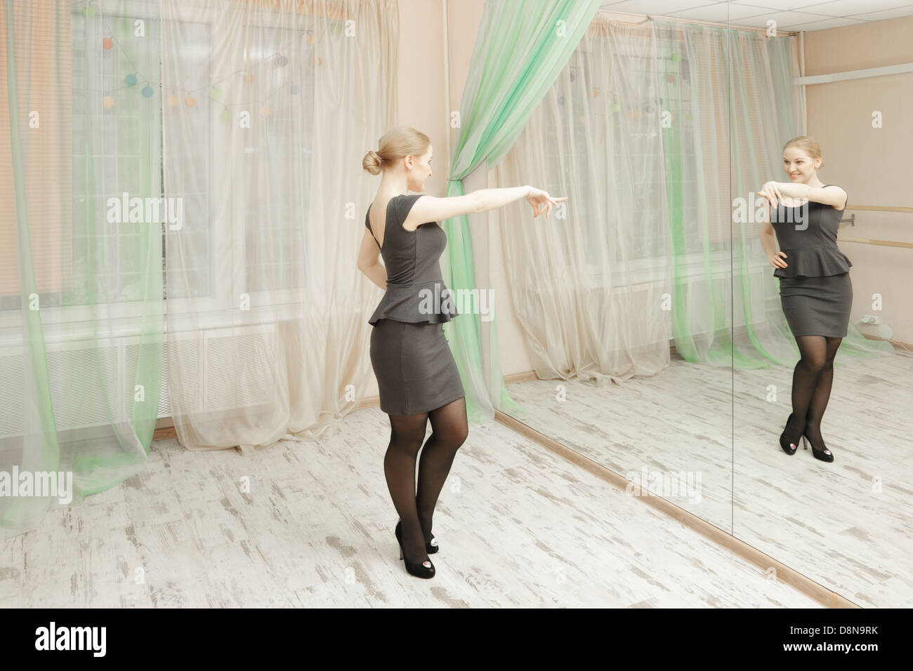 Blonde woman dancing hi-res stock photography and images - Alamy