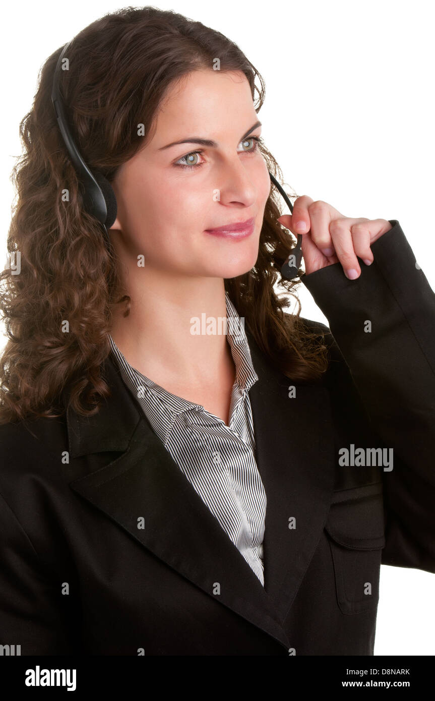 Corporate woman talking over her headset, isolated in a white background Stock Photo