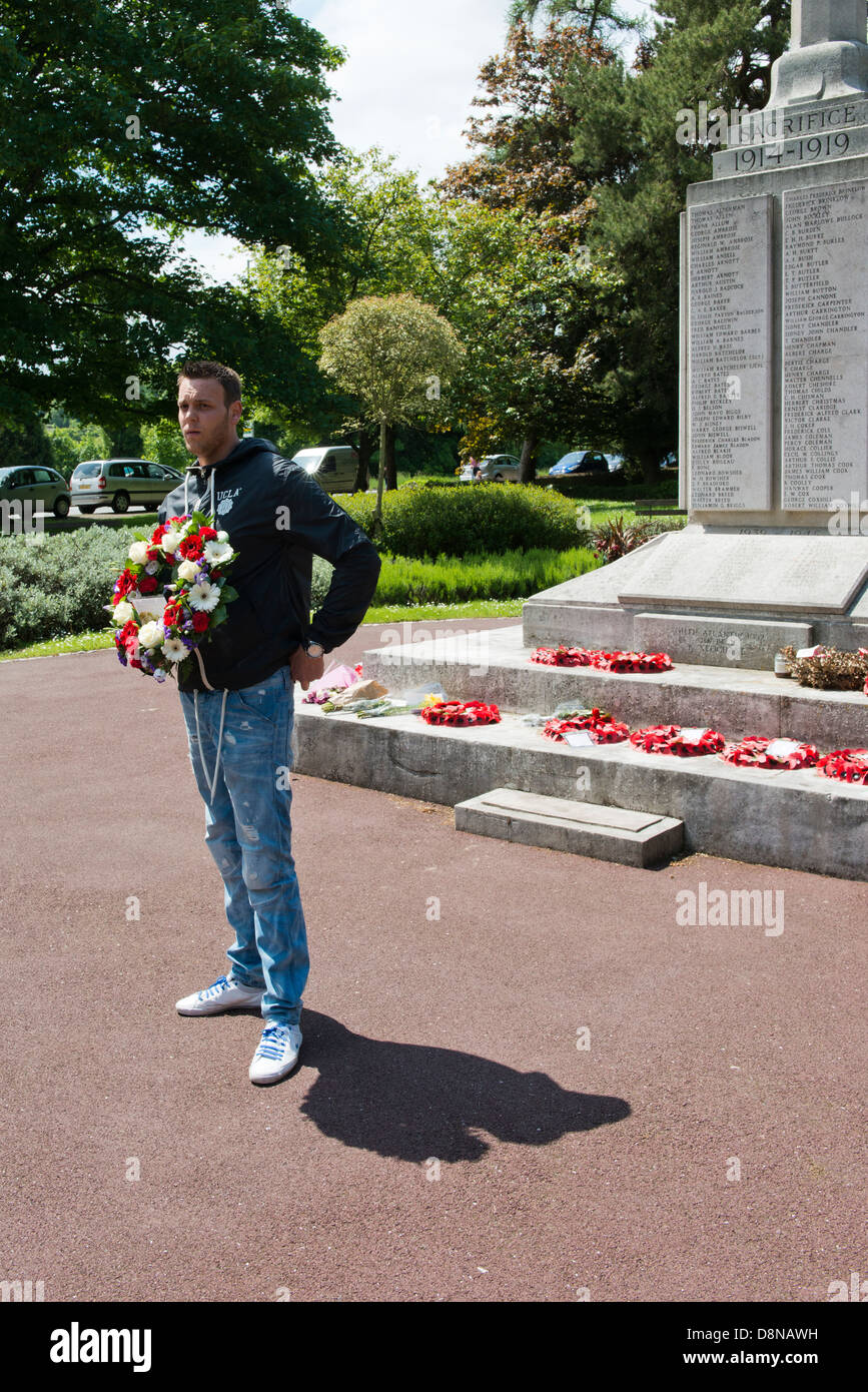A small group of English Defense League (EDL) supporters pay their respects and lay a wreath for the murdered soldier Lee Rigby Stock Photo