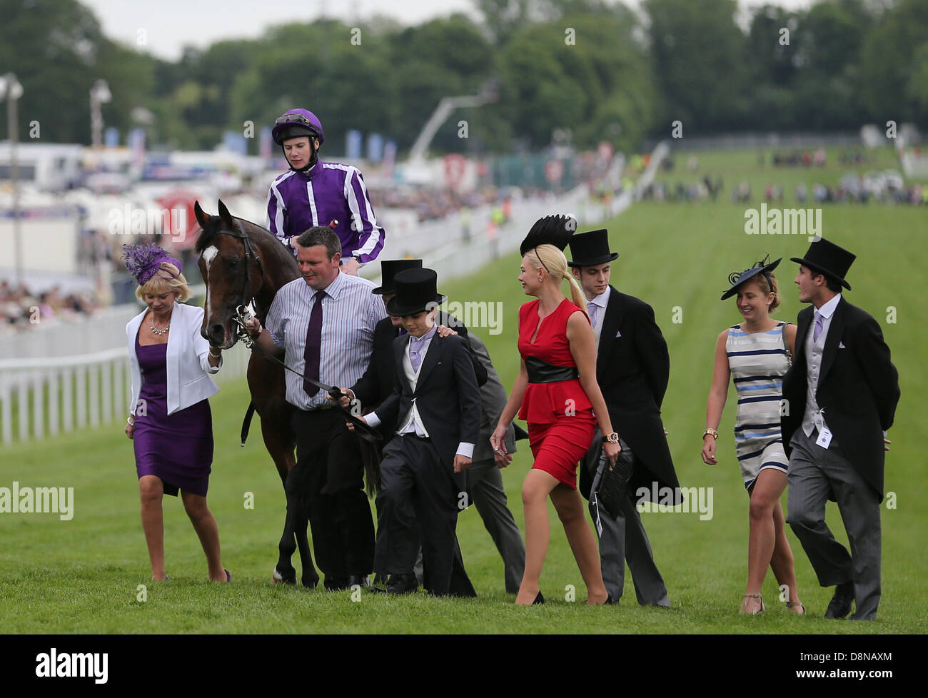 Epsom Downs, Surrey, UK. 1st June 2013.   Joseph O'Brien is led back in after riding St Nicholas Abbey to win in The Investec Coronation Cup on The Investec Derby Day from Epsom Racecourse. Credit:  Action Plus Sports Images/Alamy Live News Stock Photo