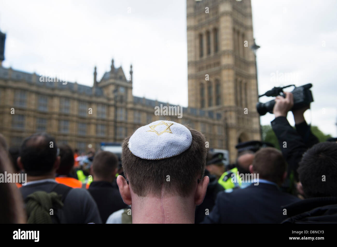 Anti-fascist, anti-Nazi party protest outside Parliament, London. A Jewish male wears a white skull cap with a gold Star of David embroidered on it. Stock Photo