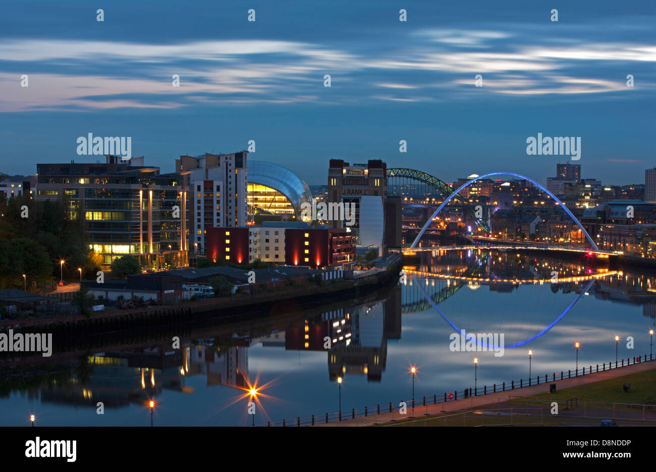 A dusk view of Newcastle and Gateshead quayside with reflections in the