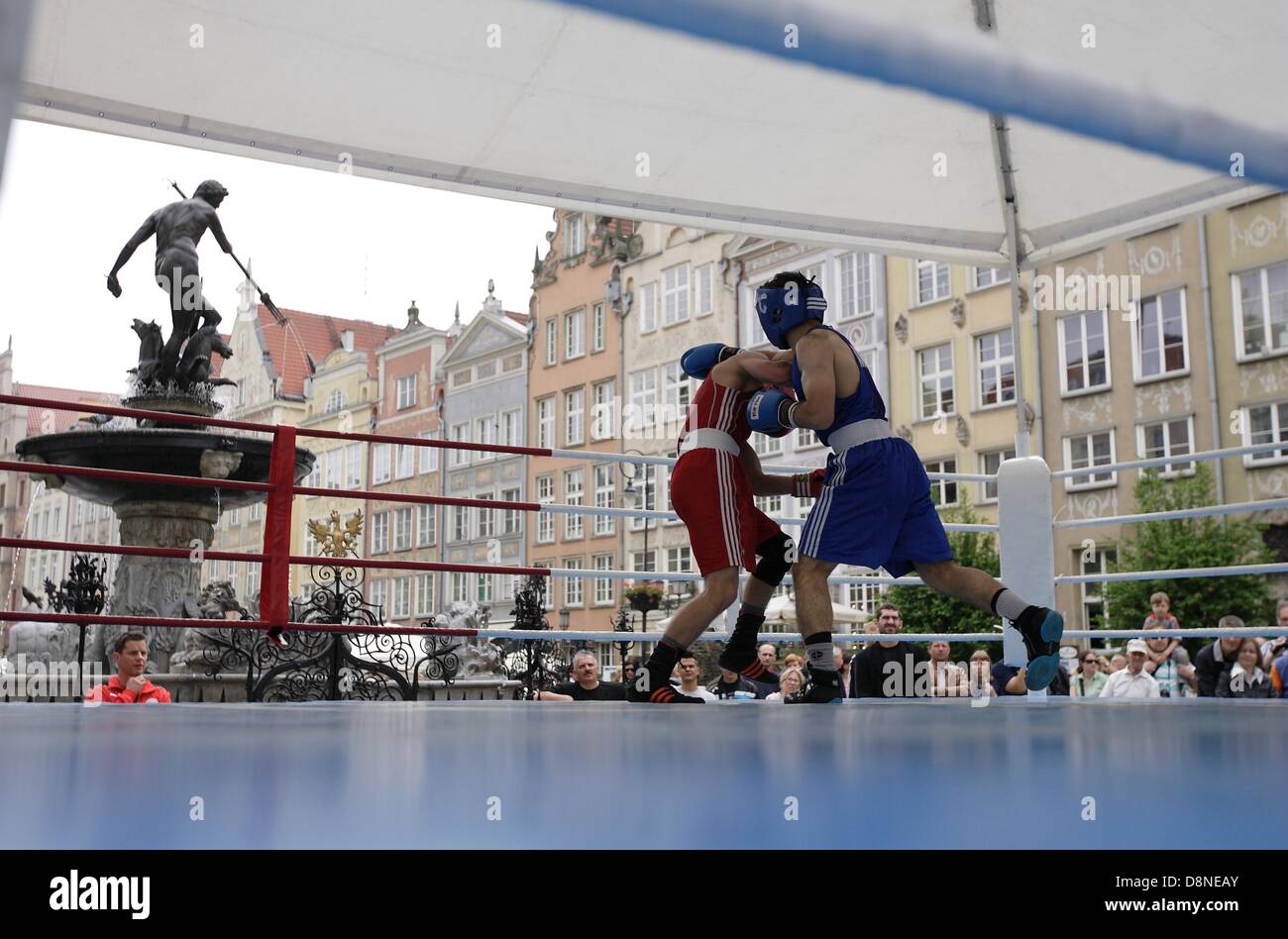 Gdansk, Poland 1st, June 2013 Zygmunt Chychla's  International Boxing Tourney in Gdansk city center in front of Neptune fountain. Marcel Shneider from Germany (red) fights against Bages Mohummadi from Sweeden (blue) Credit:  Michal Fludra/Alamy Live News Stock Photo