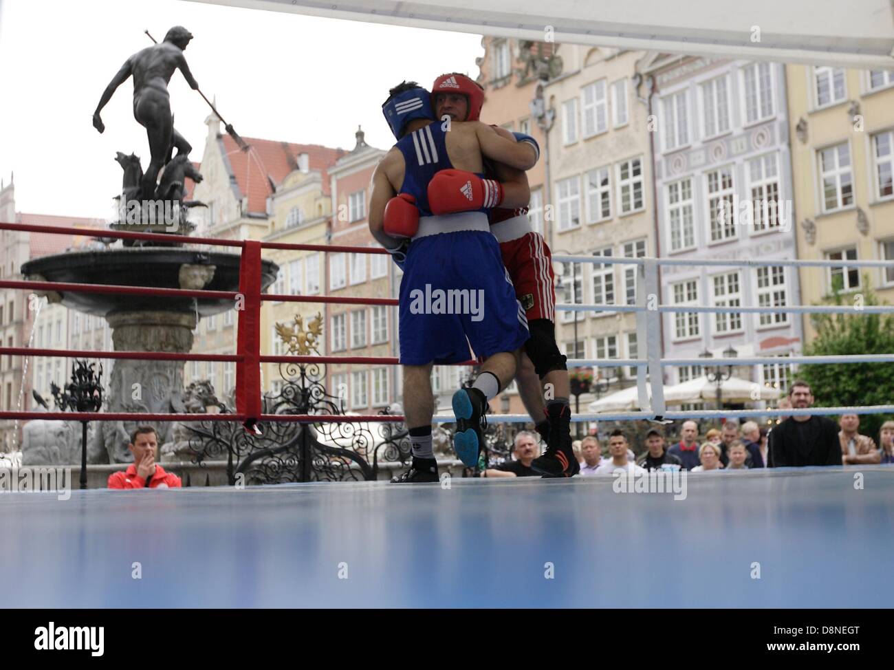 Gdansk, Poland 1st, June 2013 Zygmunt Chychla's  International Boxing Tourney in Gdansk city center in front of Neptune fountain. Marcel Shneider from Germany (red) fights against Bages Mohummadi from Sweeden (blue) Credit:  Michal Fludra/Alamy Live News Stock Photo