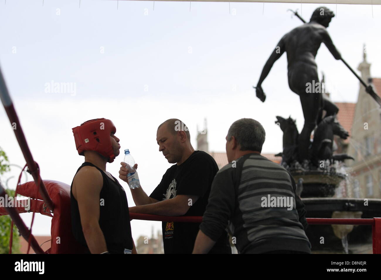 Gdansk, Poland 1st, June 2013 Zygmunt Chychla's  International Boxing Tourney in Gdansk city center in front of Neptune fountain. Olek Nadolny from Poland (black) fights against Alexander Asmus from Sweden (blue) Credit:  Michal Fludra/Alamy Live News Stock Photo