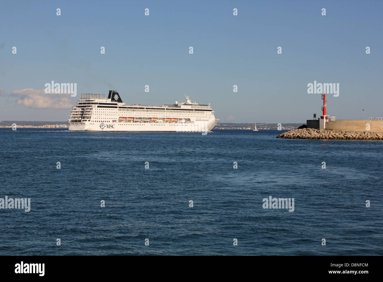 MSC Cruises Cruise Ship “Sinfonia” (251 mtrs) at late afternoon leaving the Port of Palma de Mallorca / Majorca, Baleares Stock Photo
