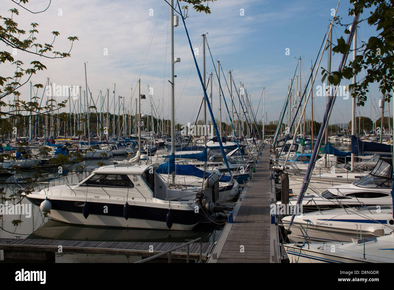 Boats moored along a pontoon at Chichester Marina, West Sussex Stock Photo Alamy