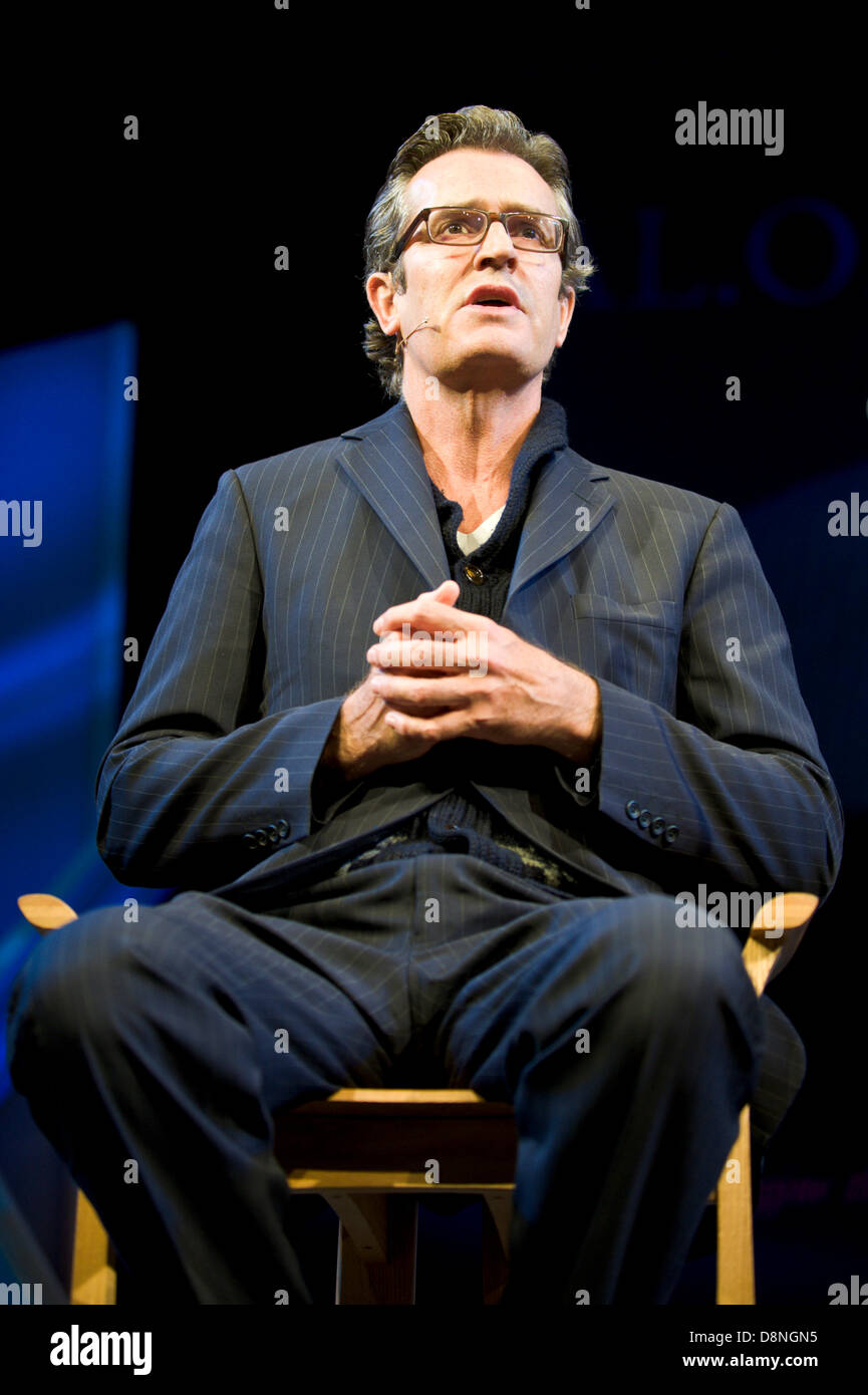 Rupert Everett actor talking about his new memoir on stage at Hay Festival 2013 Hay on Wye Powys Wales UK Stock Photo