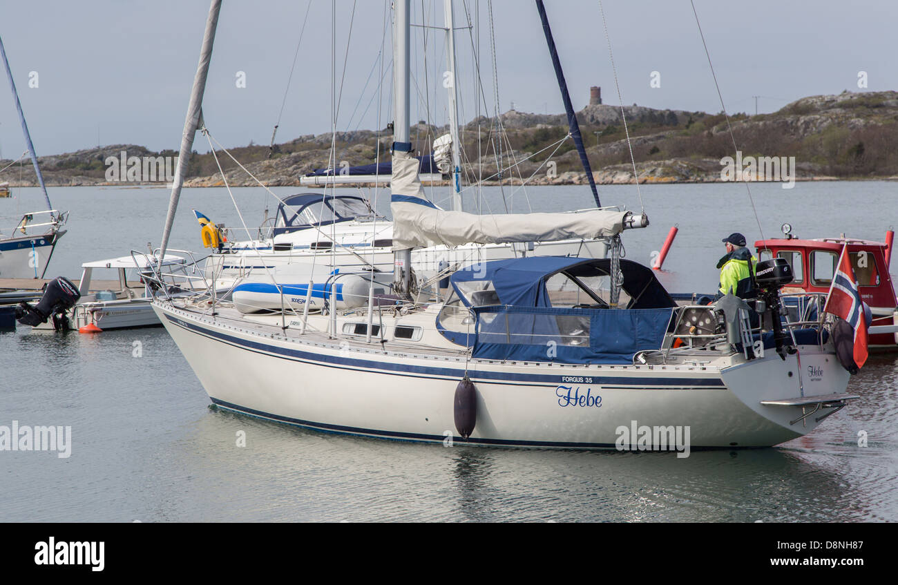 Sailboat in the Bratten harbor on Styrsö, an archipelago island near ...