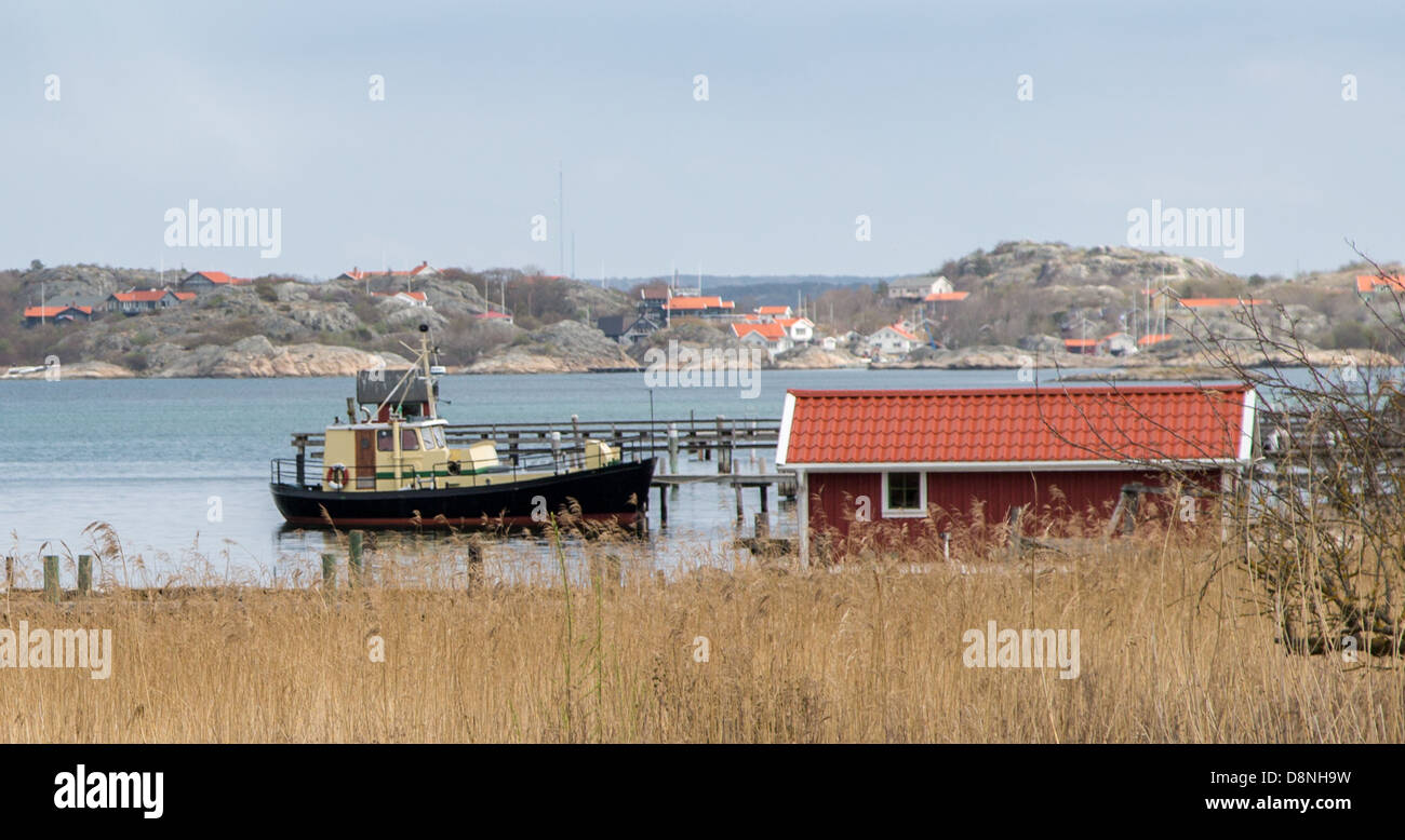 Boat in the Bratten harbor on Styrsö, an archipelago island near ...