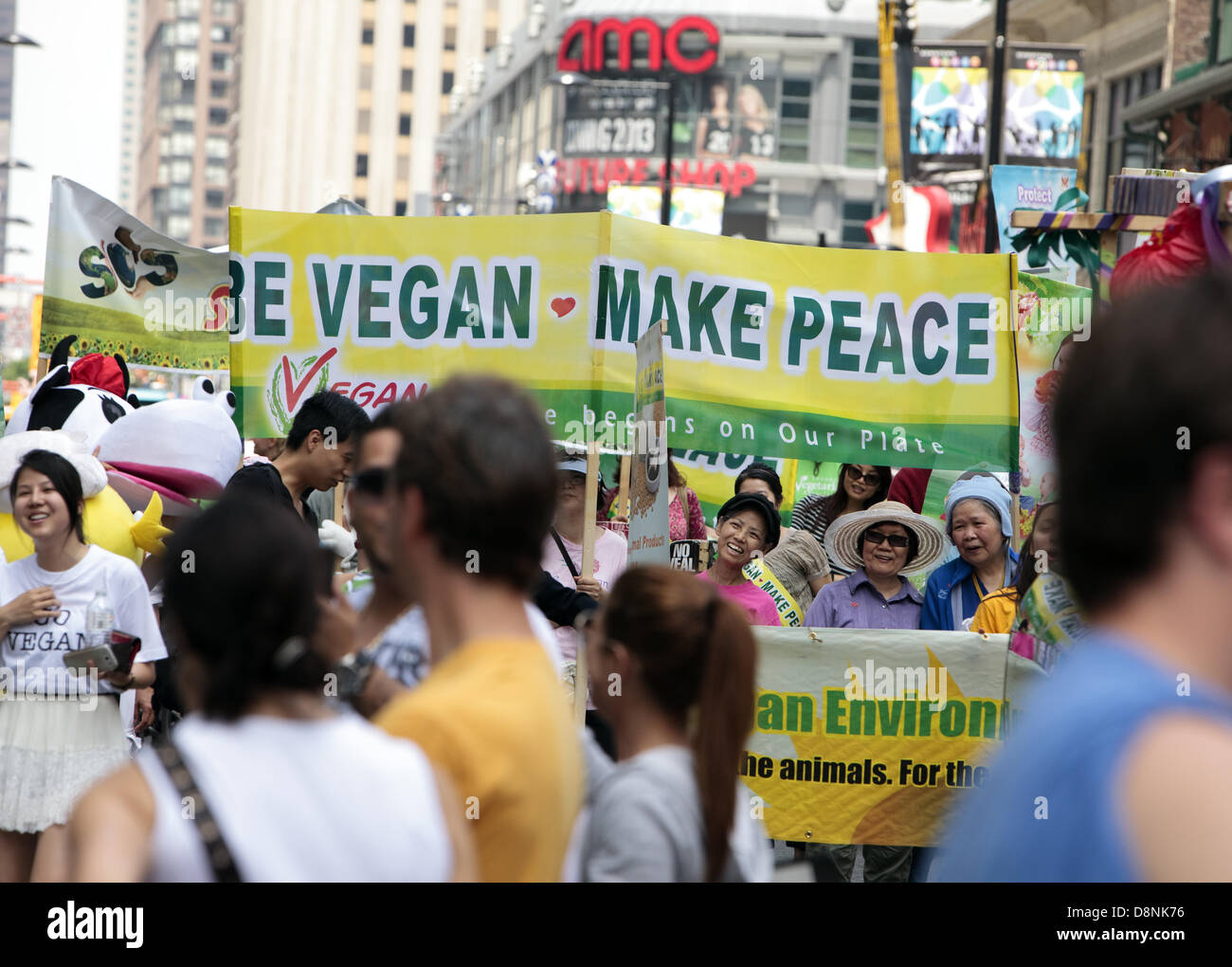 Toronto, Canada. 1st June, 2013. Veggie Pride Parade participants  marching on Yonge street  June 1, 2013    in Toronto, Canada. Stock Photo