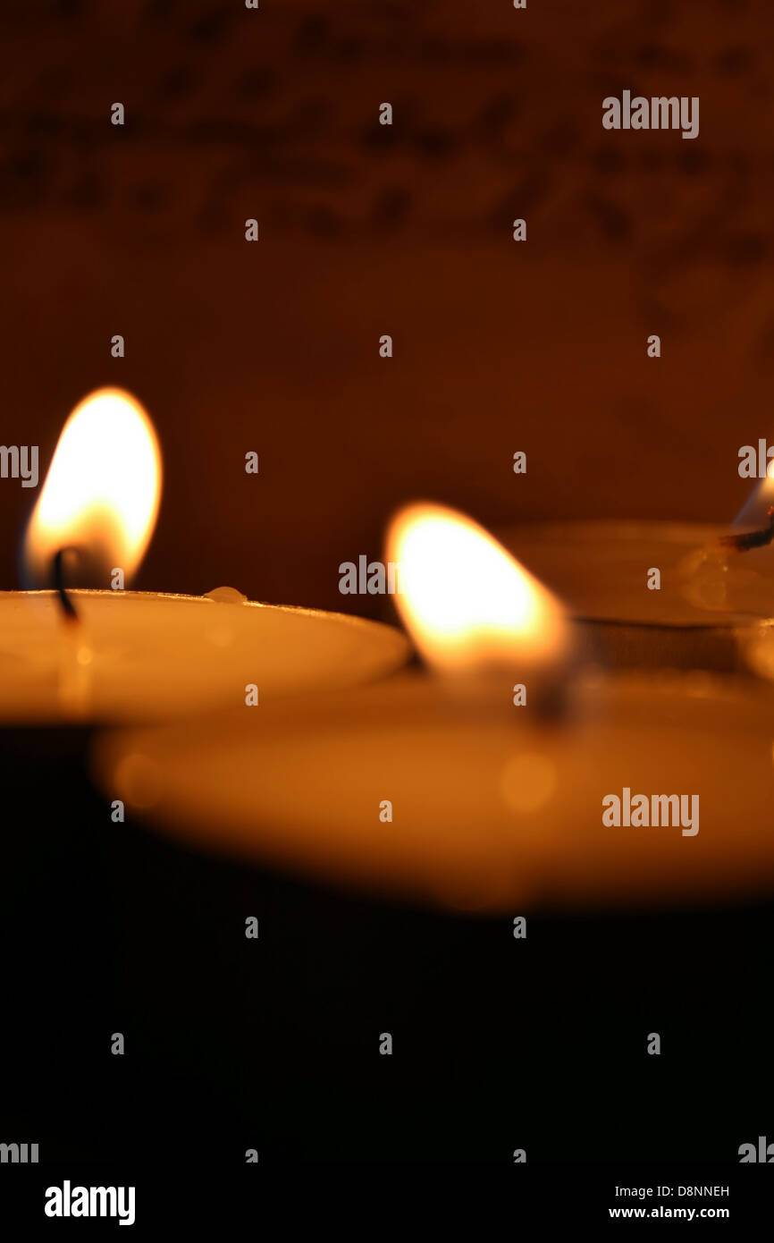 candle lights while praying Stock Photo Alamy