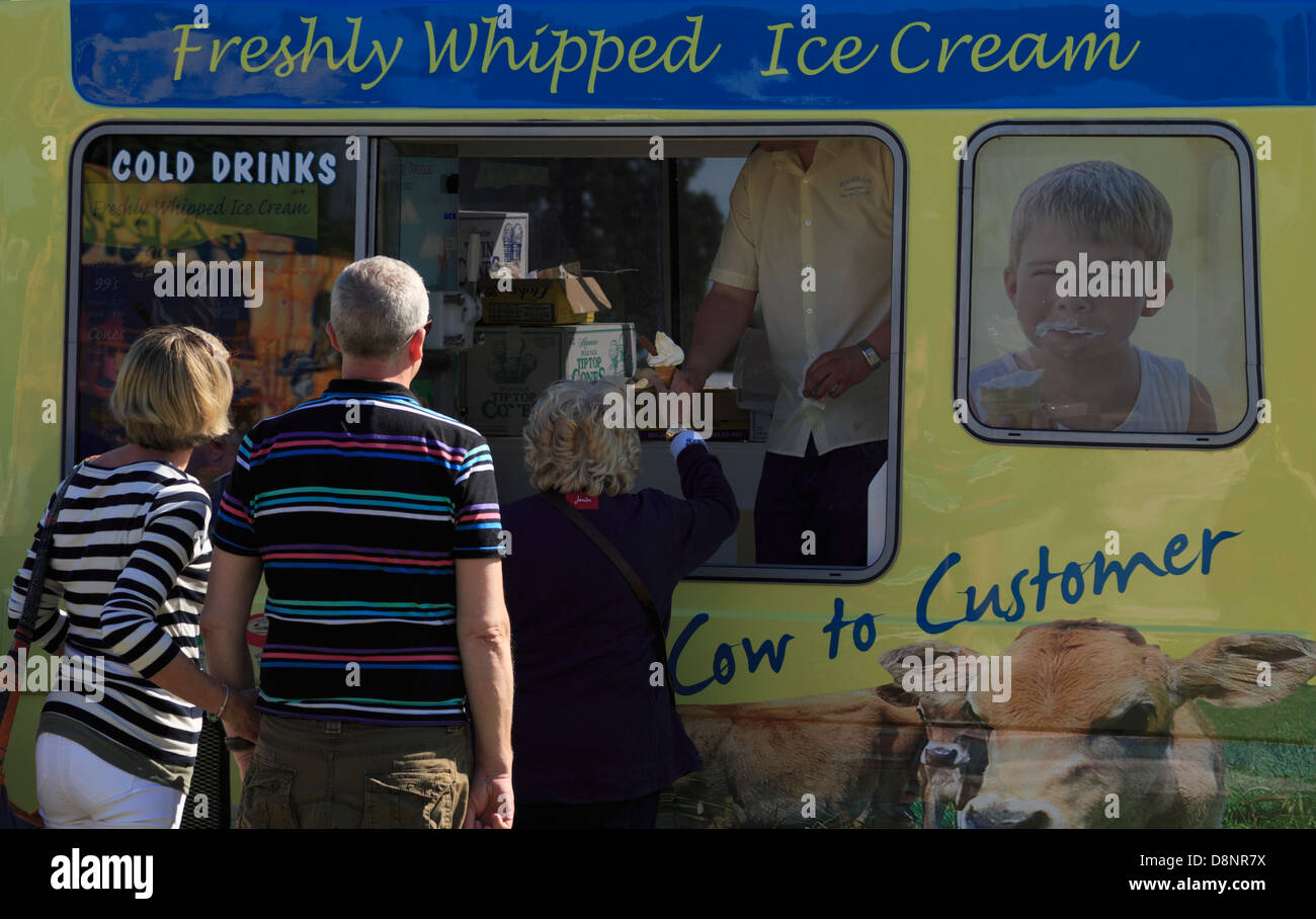 People queuing to buy ice cream on a hot sunny day at Game and Country Fair 26th May 2013, Burghley House Stock Photo