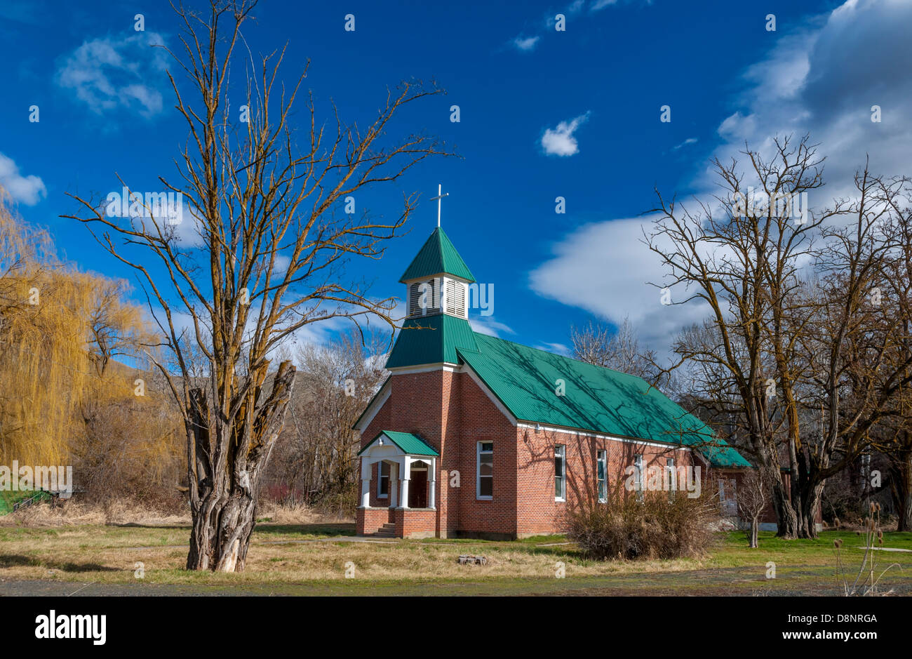 Rural country church and blue sky Stock Photo