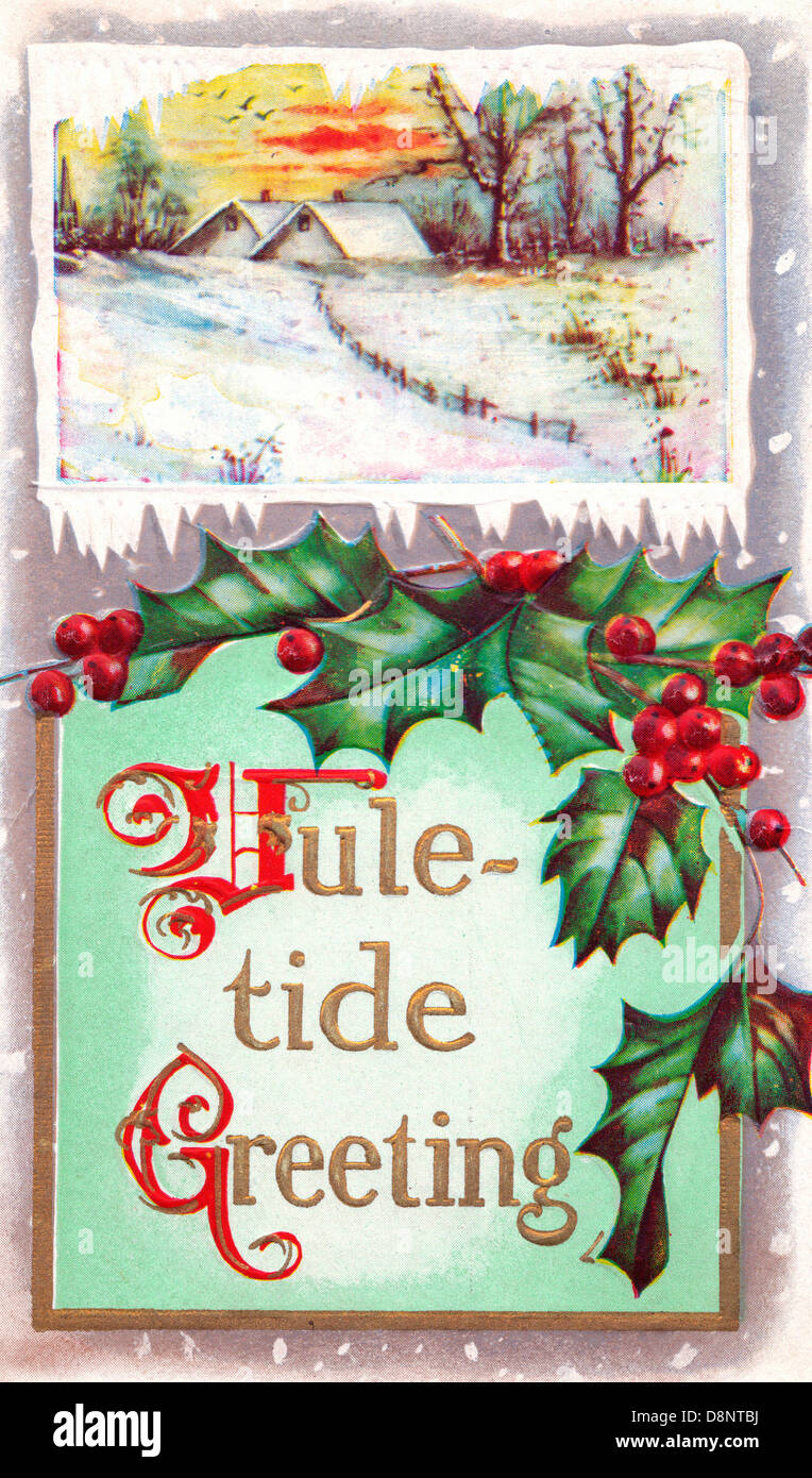 Yuletide Greetings - Vintage Card with winter scene and Holly Stock Photo