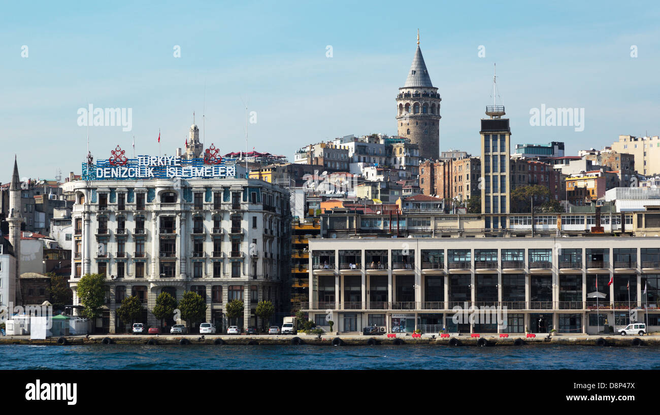 The Galata Tower and Turkey Maritime Organisation buidling in the Beyoglu district of Istanbul Turkey seen from the Bosphorus Stock Photo