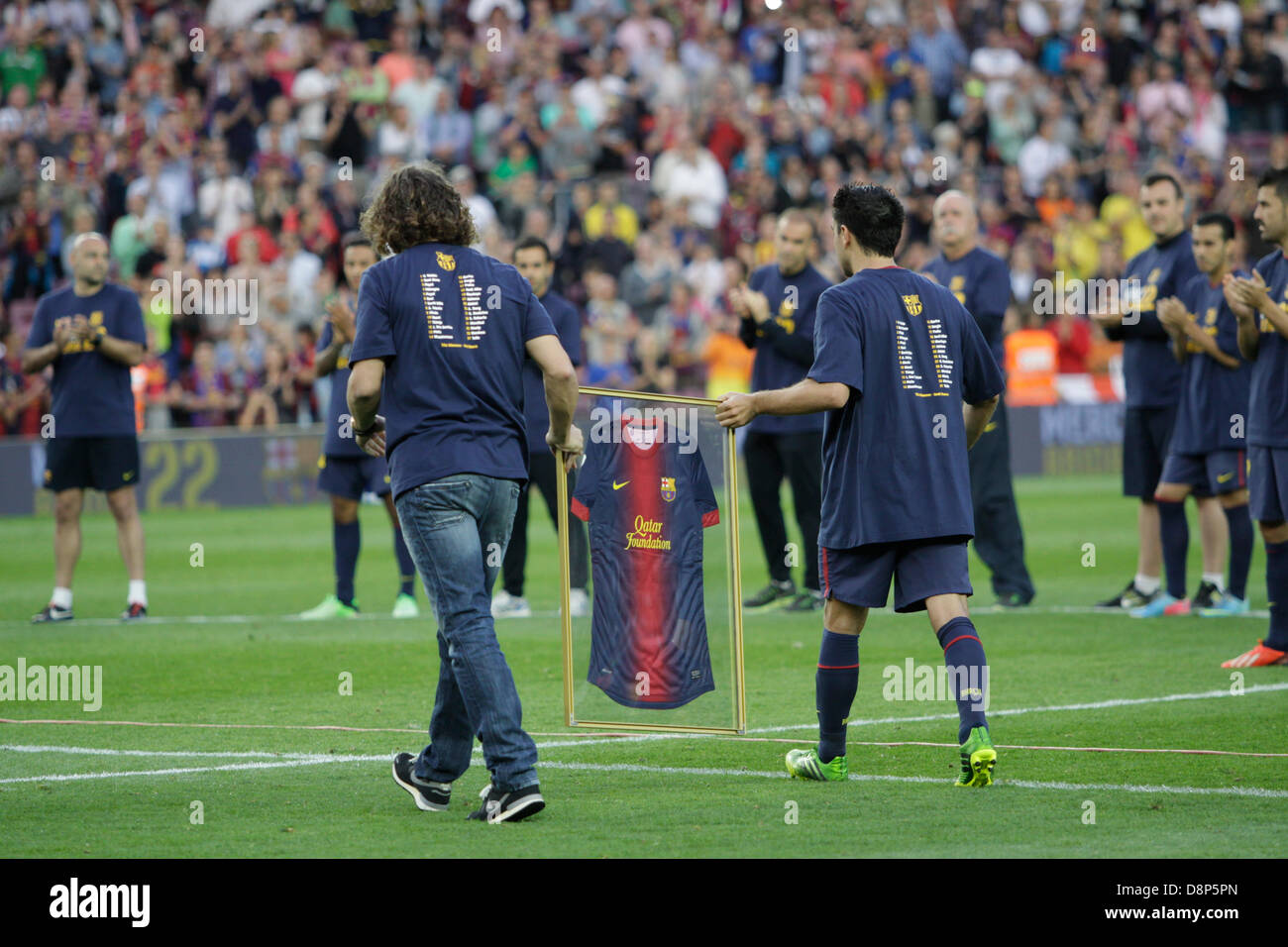 Barcelona, Spain. 1st June, 2013. Final day of 2012-13 La Liga season.   Picture shows Carles Puyol and Xavi Hernandez during Abidal's farewell after game FC Barcelona v Malaga at Camp Nou. Credit:  Action Plus Sports Images/Alamy Live News Stock Photo