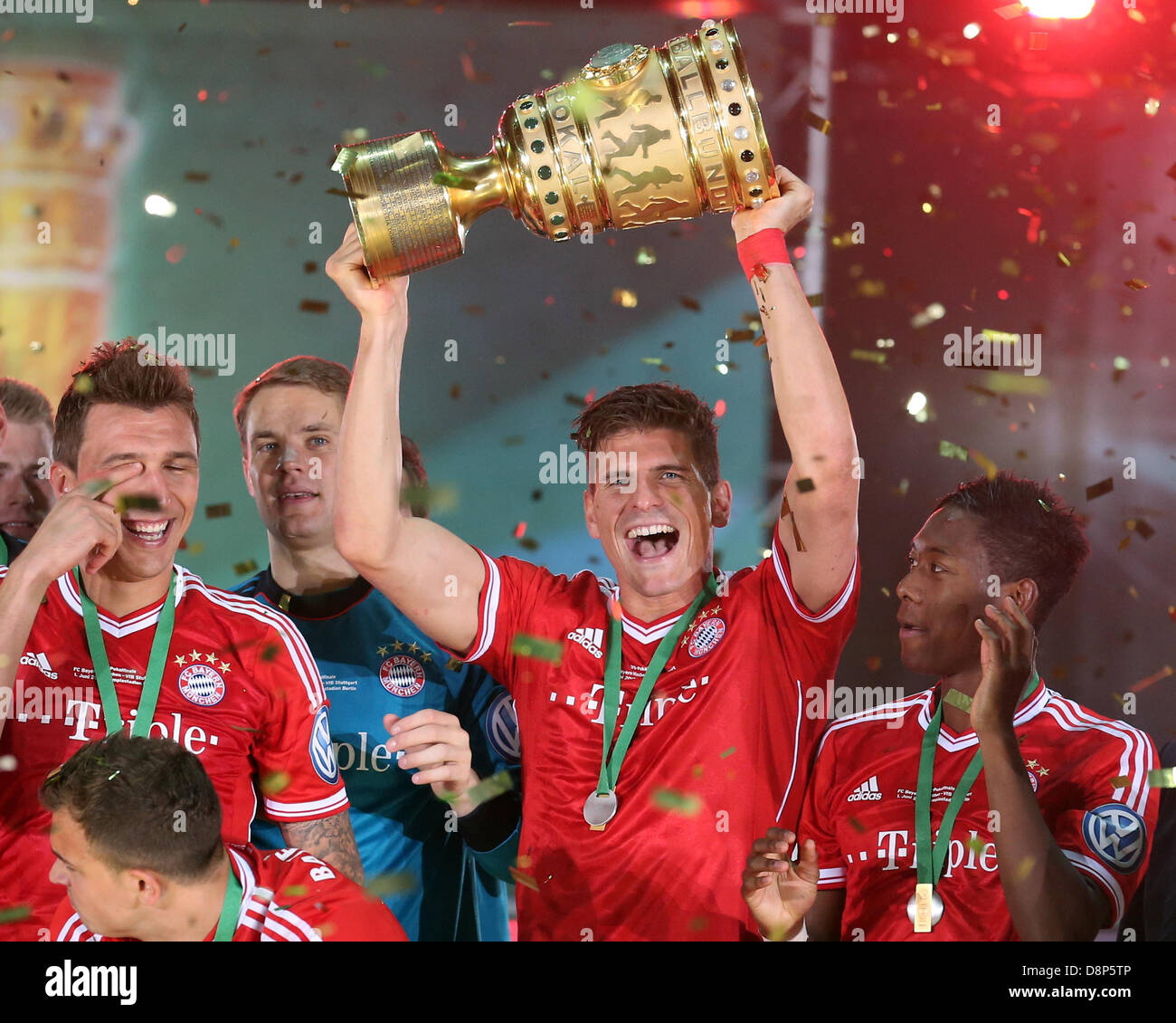 Berlin, Germany. 1st June, 2013. Munich's Mario Gomez celebrates after  winning the German DFB Cup final soccer match between FC Bayern Munich and  VfB Stuttgart at the Olympic Stadium in Berlin, Germany,