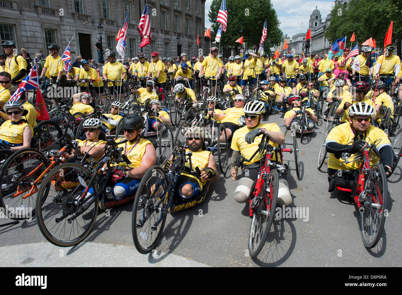 London, UK. 2nd June, 2013. Cyclists raising money to support the Help for Heroes charity arrive at the Whitehall war memorial. Some have cycled from Paris. 2nd June 2013. Credit:  Stephen Ford/Alamy Live News Stock Photo
