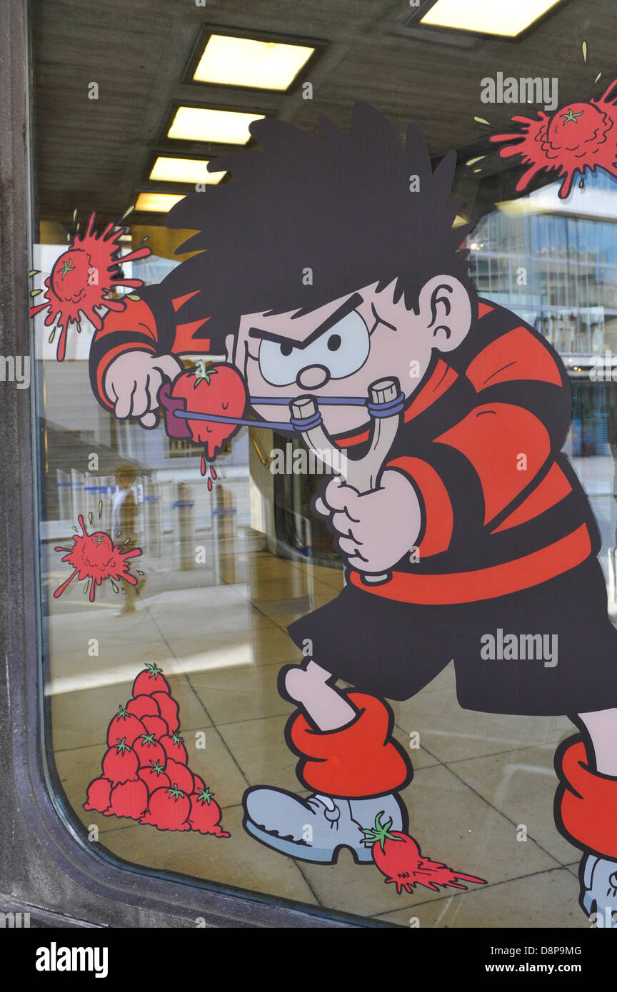 Southbank Centre, London, UK. 2nd June 2013. Dennis the Menace on a window as part of Beanotown, a celebration of the children's comic. Beanotown in the Southbank Centre in London, 'Beanotown is the home of Dennis the Menace and Gnasher, The Bash Street Kids, Minnie the Minx, Roger the Dodger, plus all the other comic strip superstars from The Beano'. Beanotown is on from 31st May to 8th September. Credit:  Matthew Chattle/Alamy Live News Stock Photo