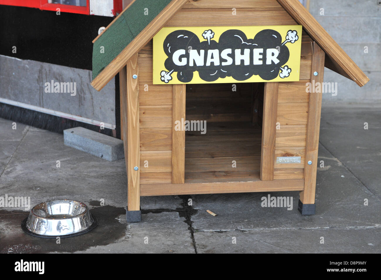 Southbank Centre, London, UK. 2nd June 2013.  A 'Gnasher' kennel with a dish of water for real dogs at Beanotown, a celebration of the children's comic. Beanotown in the Southbank Centre in London, 'Beanotown is the home of Dennis the Menace and Gnasher, The Bash Street Kids, Minnie the Minx, Roger the Dodger, plus all the other comic strip superstars from The Beano'. Beanotown is on from 31st May to 8th September. Credit:  Matthew Chattle/Alamy Live News Stock Photo