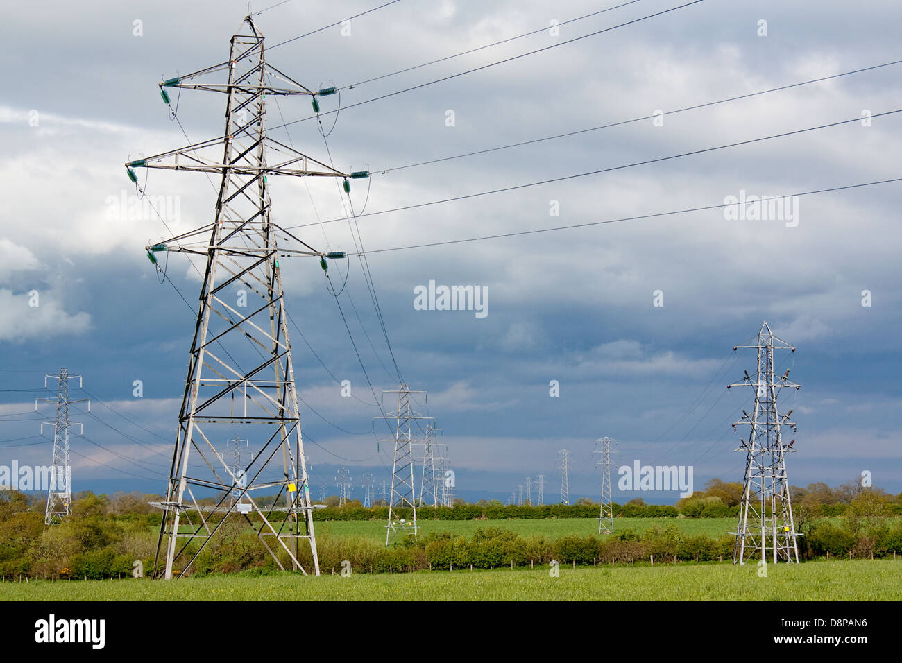 Electricity Pylons Part Of The National Grid With Cables Stretching Into The Distance Stock Photo Alamy