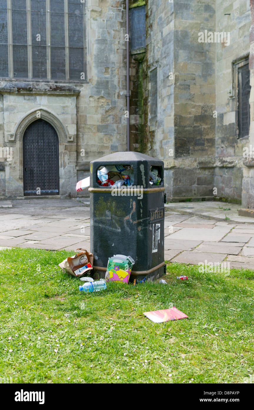 Overflowing full waste bin Stock Photo - Alamy