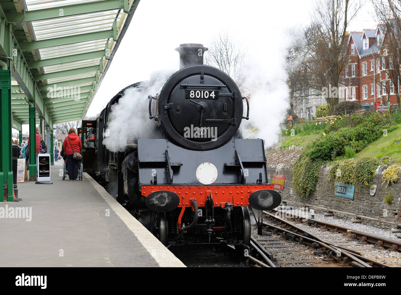 BR Standard Class 4 locomotive No. 80104 arriving a swanage with a service train from Corfe castle Dorset England uk Stock Photo