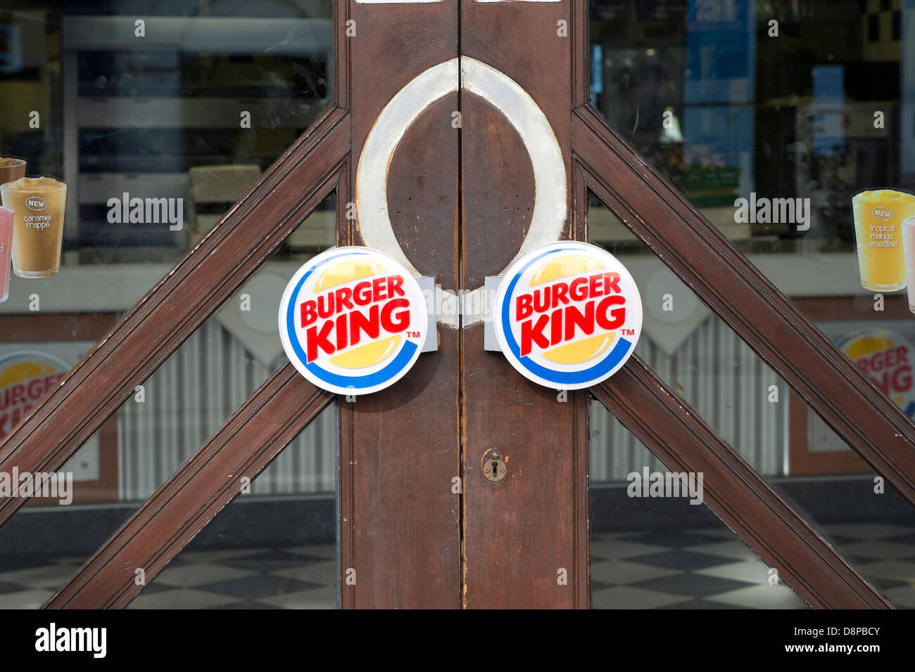 Door handles at entrance to Burger KIng restaurant Stock Photo Alamy