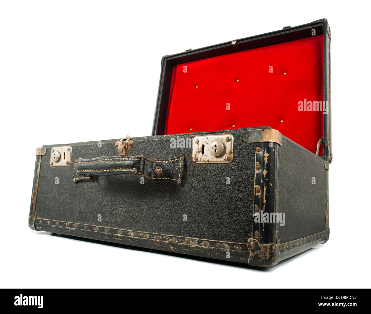 Opened old travel leather suitcase. Red color inside Stock Photo
