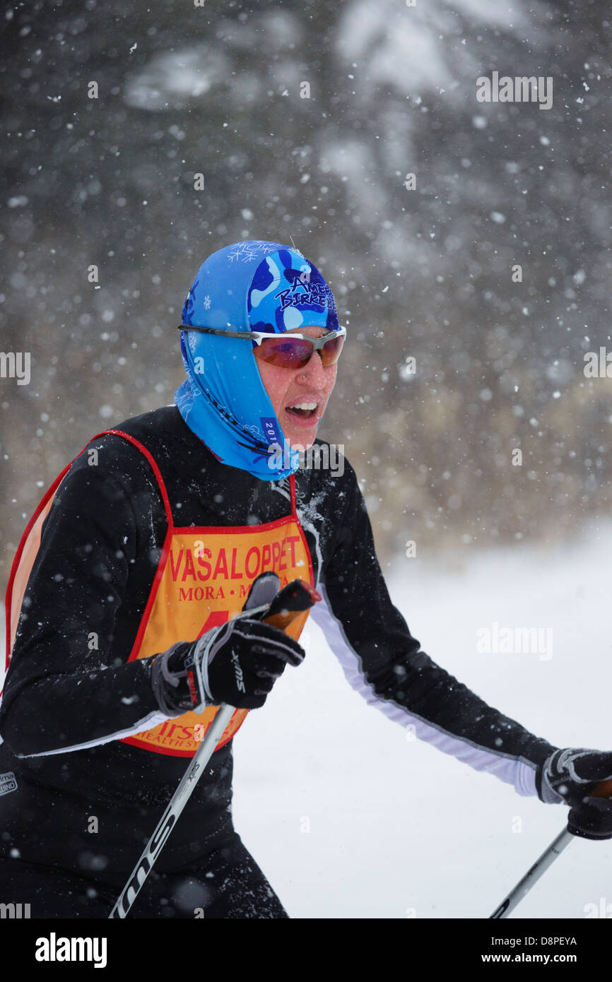 A woman competes in the Mora Vasaloppet ski race on February 10, 2013 in Mora, Minnesota. Stock Photo
