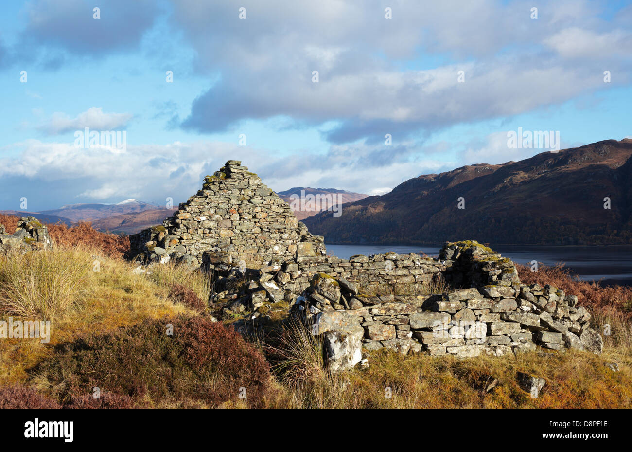 Ruined dry-stone 'black house' croft overlooking Loch Carron Wester Ross Scottish Highlands UK Stock Photo