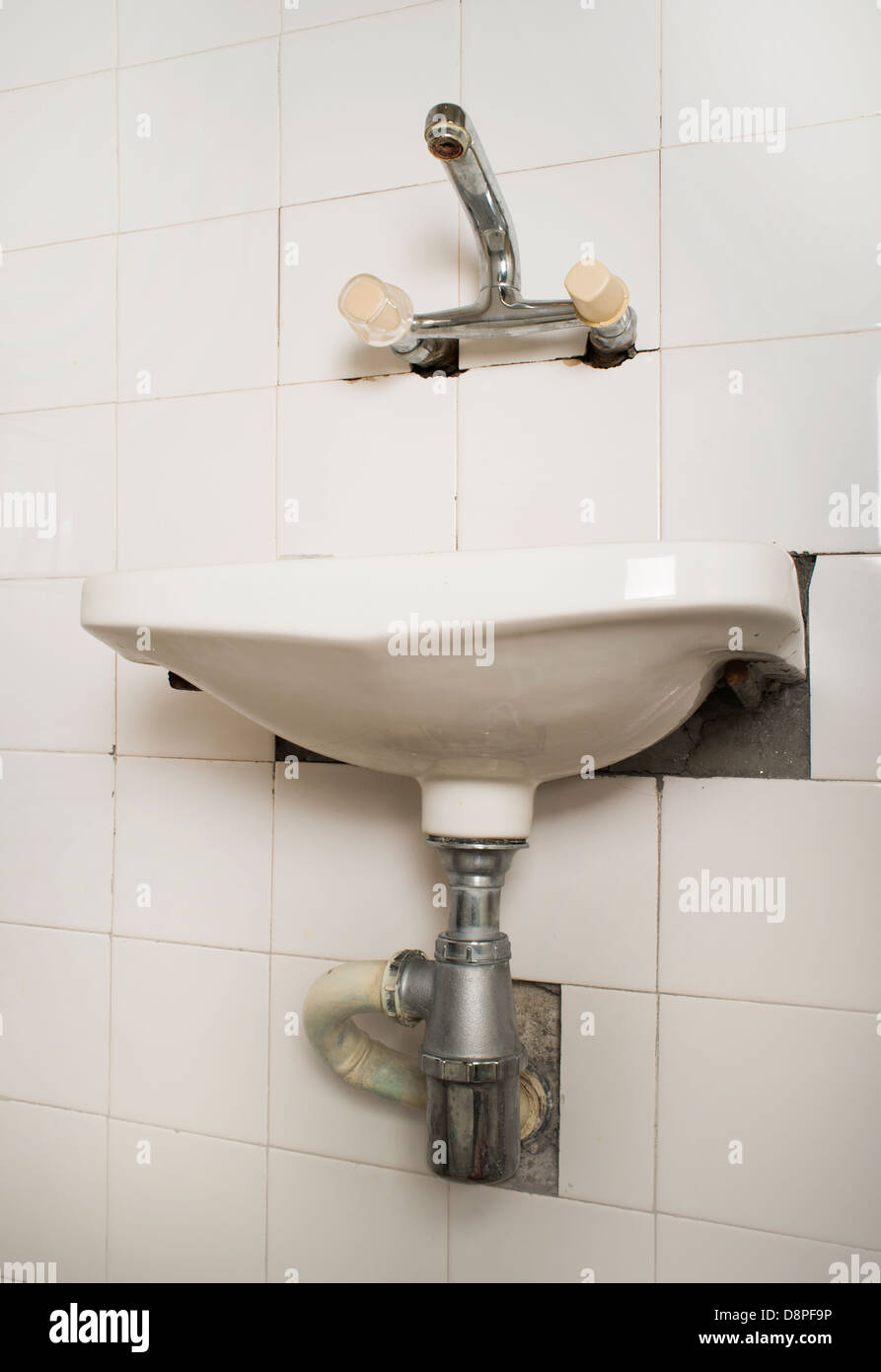 Sink and pipes. Old bathroom Stock Photo Alamy