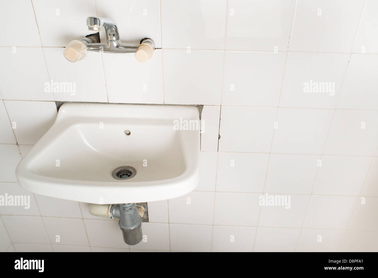 Sink and pipes. Old bathroom Stock Photo Alamy