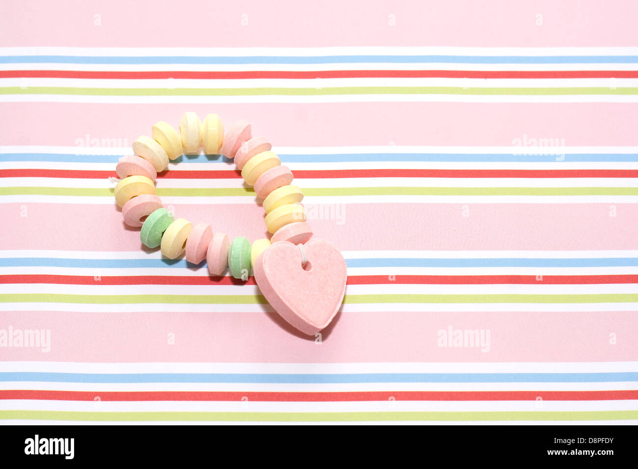 Candy bracelet with heart Stock Photo