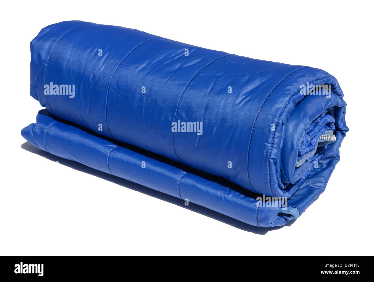 Blue sleeping bag rolled up Stock Photo