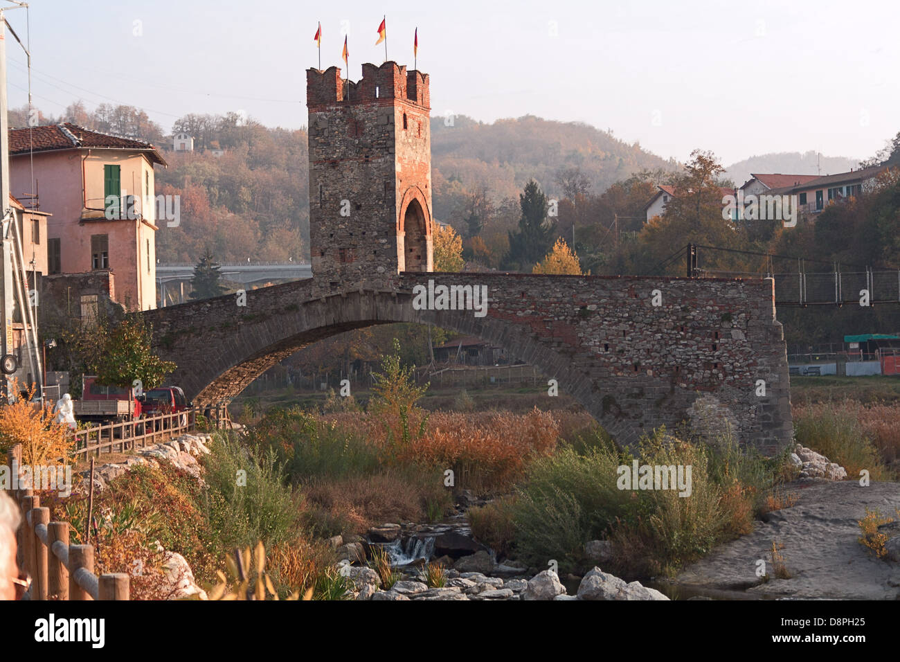 The particoular bridge with tower in Millesimo, a ligurian town Stock Photo