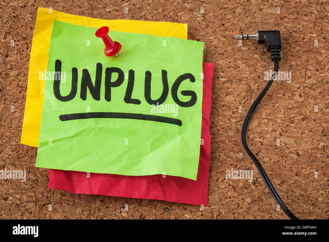 unplug - lifestyle or information overload concept - handwriting on colorful sticky notes Stock Photo