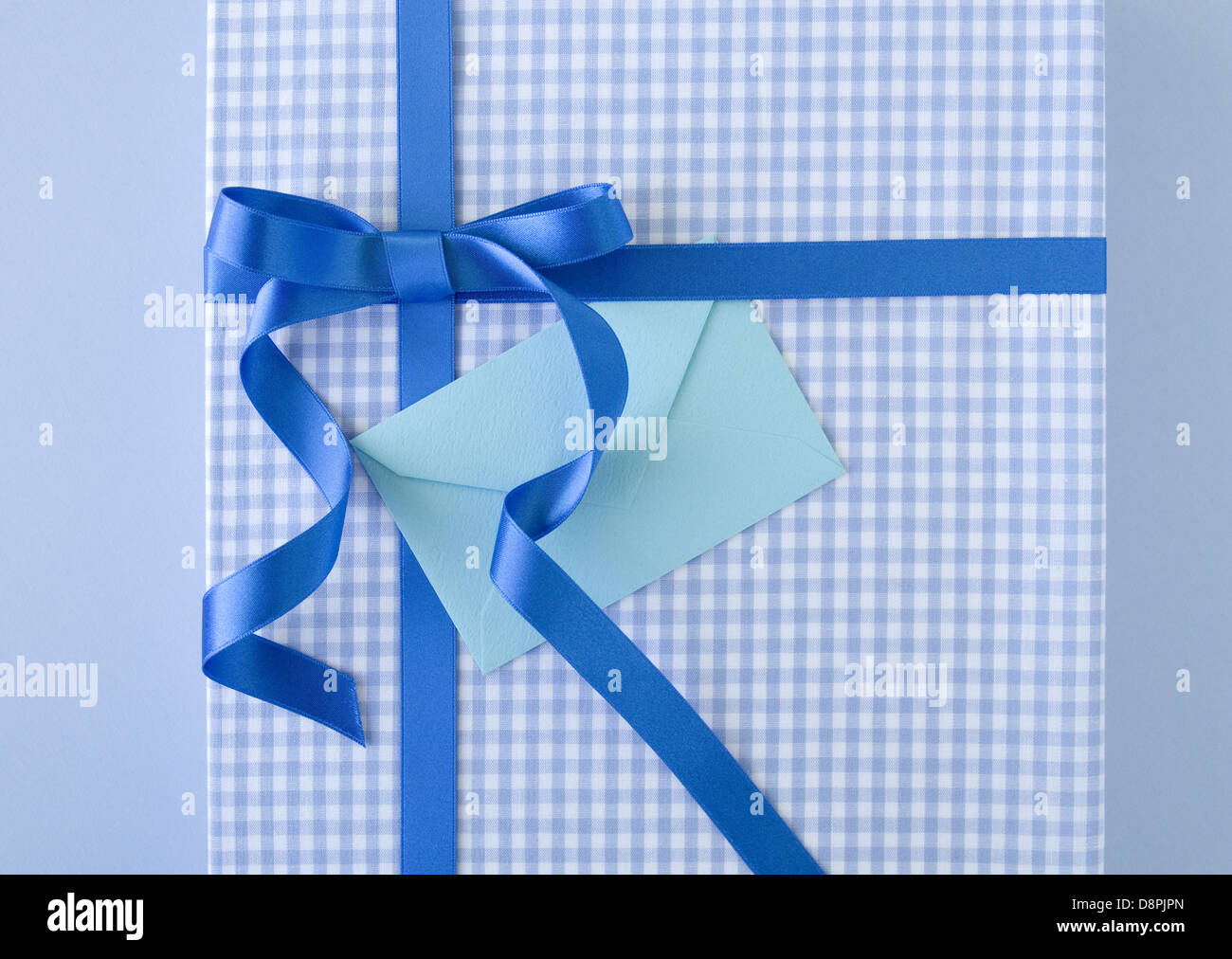 Blue gift box and a greeting card Stock Photo Alamy