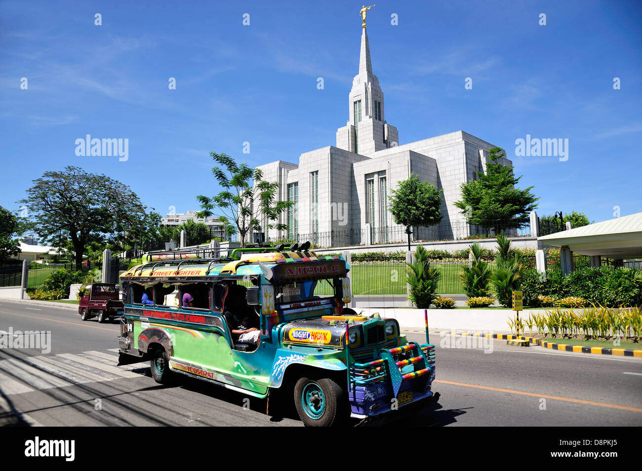 Jeepney passing Mormon Church Lahug Cebu City Philippines Stock Photo
