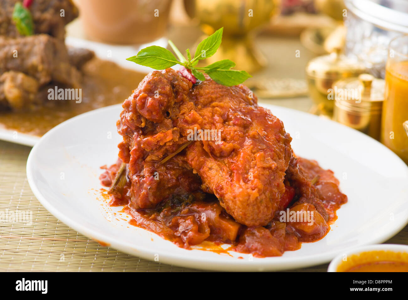 curry chicken rendang cooked in indian style with spicy sauce and chilli Stock Photo