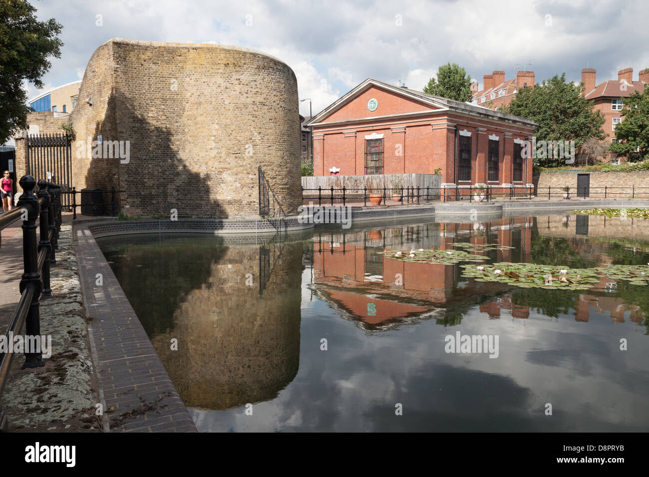 Reflection of old wall in Hermitage Basin, Wapping, London Stock Photo ...