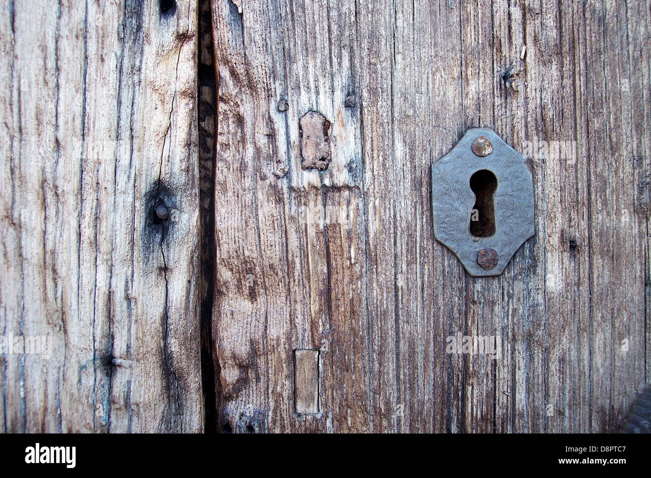 key key patch old port entry door rust keyhole Stock Photo