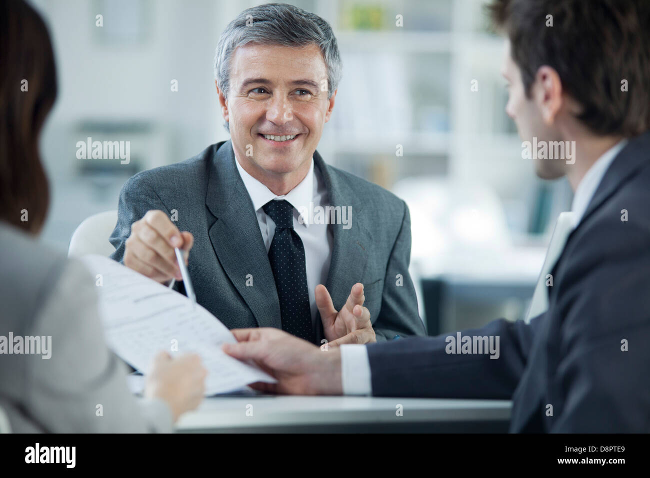 Businessman meeting with clients Stock Photo