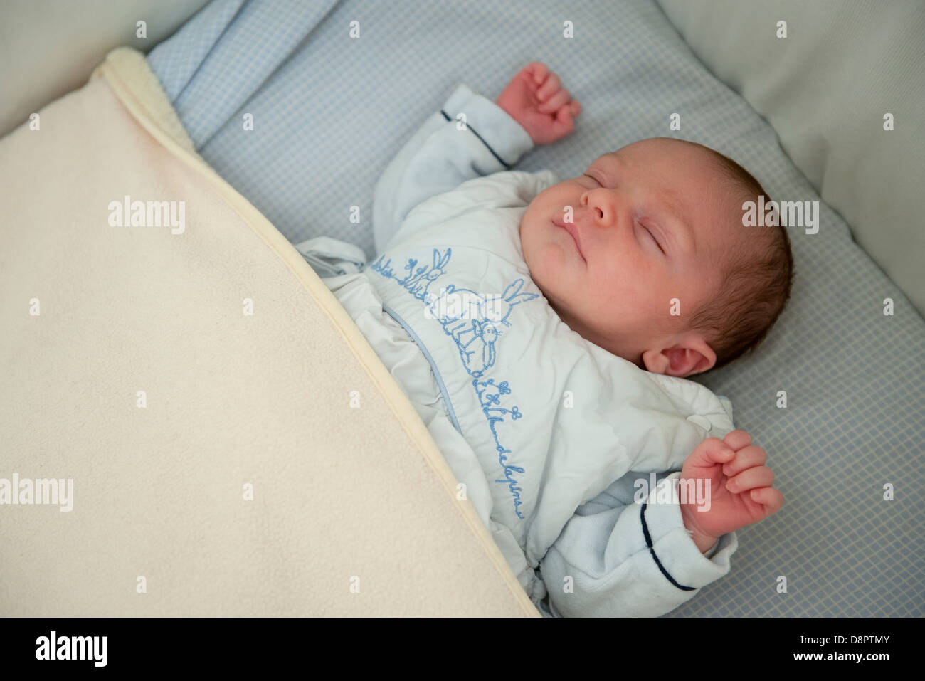 Baby boys sleeping on blanket hi-res stock photography and images - Alamy