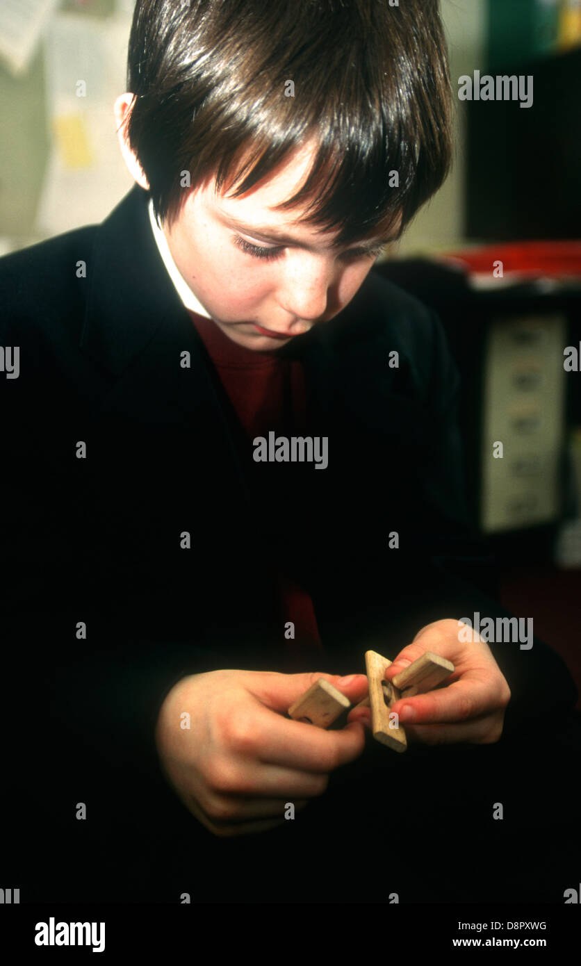 Educational psychologist using abstract testing with pupil with reading