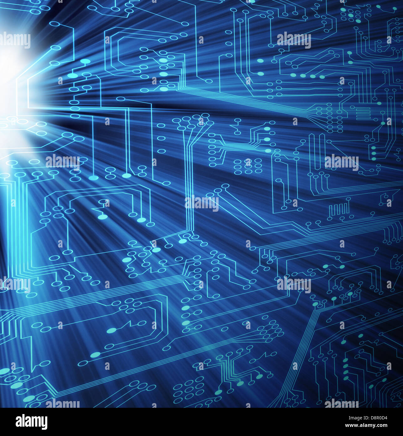 Modern circuit board with light rays shining through with a blue theme ...