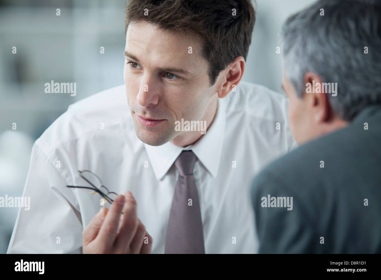 Businessmen discussing work Stock Photo