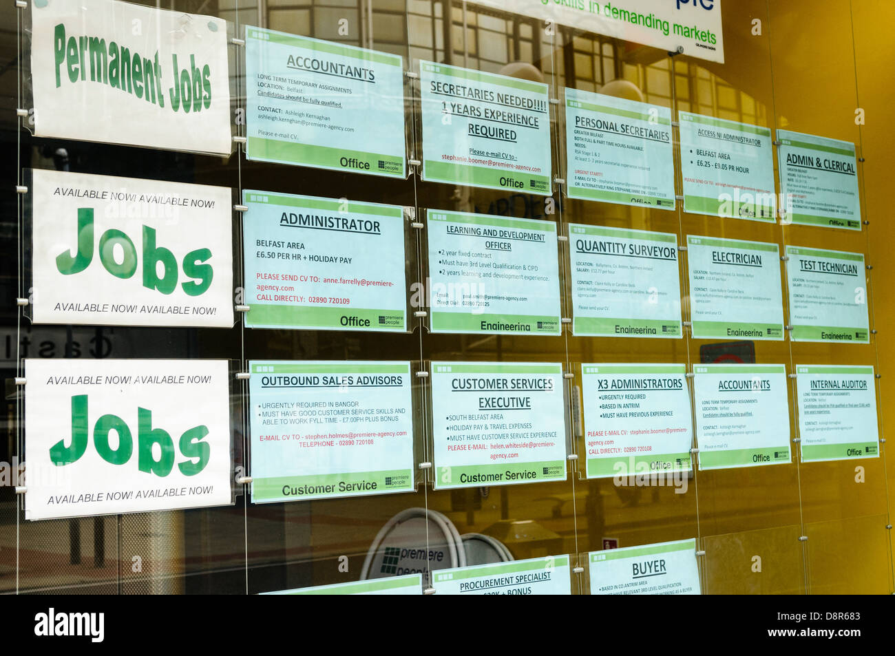 Office Job advertisements in the window of an agency Stock Photo
