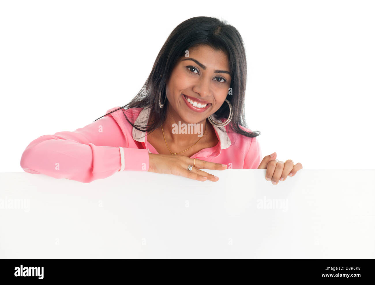 Indian woman holding blank billboard portrait of attractive young